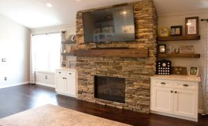 Shaker White Cabinets in Living Room Beside Fireplace